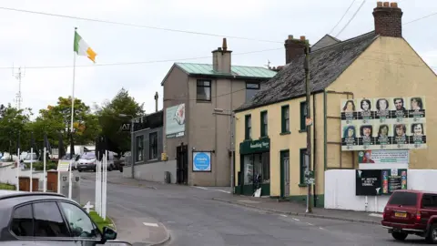 Pacemaker An Irish tricolour flies from a flagpole in Crossmaglen