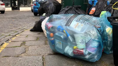 BBC Waste and recycling bags out for kerbside collection in Guernsey