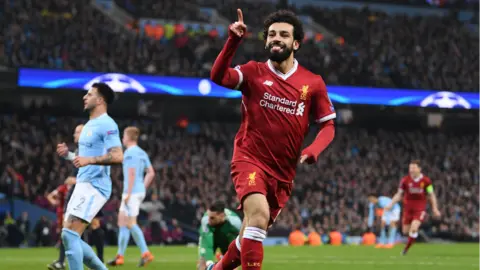 Laurence Griffiths/Getty Images Mohamed Salah of Liverpool celebrates scoring the first goal during the Quarter Final Second Leg match between Manchester City and Liverpool at Etihad Stadium on April 10, 2018 in Manchester, England.