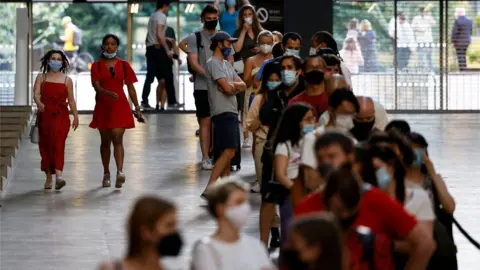 Getty Images Queuing for Covid-19 vaccinations at the Tate Modern in London