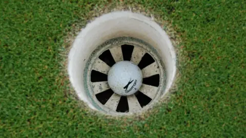 BBC Golf ball in hole
