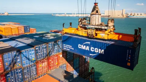 Getty Images Cargo being unloaded at the Port of Colombo