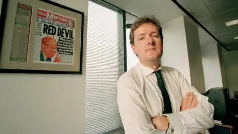 Getty Images Daily Mirror editor Piers Morgan in his office at Canary Wharf, London, 14th December 1998