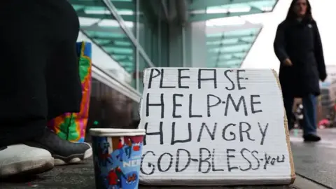 EPA Photo of a homeless person's sign