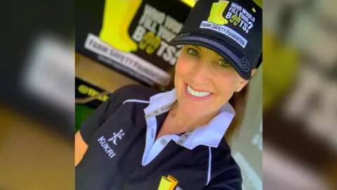 Stephanie Berkeley Selfie of Stephanie Berkeley wearing a polo shirt and baseball cap