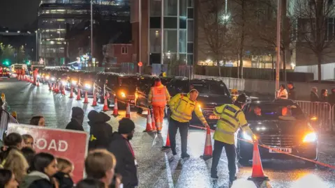 PA Media Cars queue to collect attendees fro the Chanel Metiers d'Art show after party