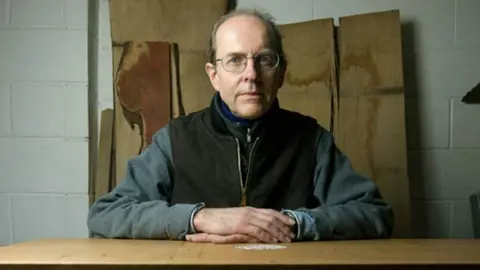 Michael Ibsen Michael Ibsen with the coffin he built