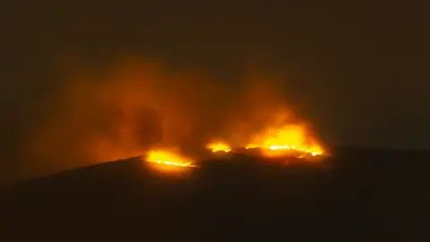 Colm Mac Aindreasa Fire on Cave Hill