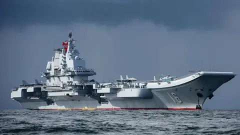 Getty Images China's aircraft carrier, the Liaoning, arrives in Hong Kong on July 7, 2017