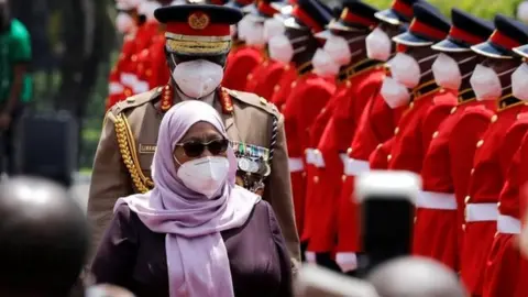 Tanzanian President Samia Suluhu Hassan, inspecting a guard of honour by the Kenya Defence Forces in Nairobi