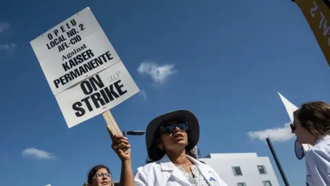 Getty Images Kaiser Permanent worker in Virginia on 4 October