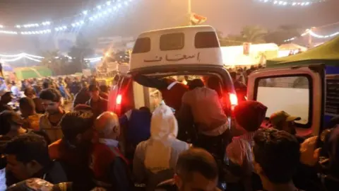 AFP Ambulances in the Iraqi capital Baghdad attend to injured protesters