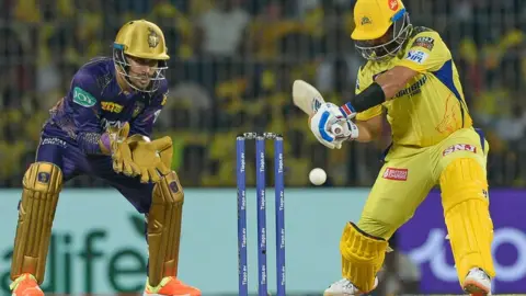 Getty Images Chennai Super Kings' Ajinkya Rahane (R) plays a shot during the Indian Premier League (IPL) Twenty20 cricket match between Chennai Super Kings and Kolkata Knight Riders at the MA Chidambaram Stadium in Chennai on May 14, 2023.