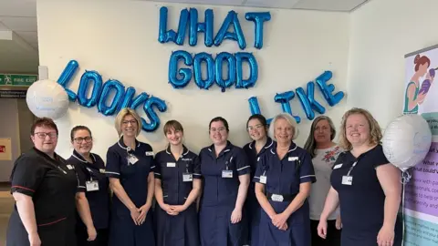 Shaun Whitmore/BBC Group of nine midwives