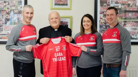 Trillick St Macartans GAC Canon John McKenna with his local GAA club