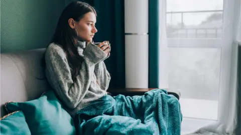 Getty Images woman in blanket