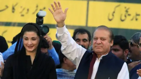 Reuters Sharif with his daughter Maryam Nawaz, who was also jailed for corruption in 2018, but who also had her sentence suspended