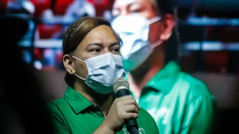 NurPhoto via Getty Images Vice presidential candidate Sara Duterte speaking at a political rally