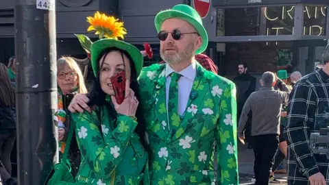St Patrick's Day Parade Liverpool People dressed up in shamrocks in 2022