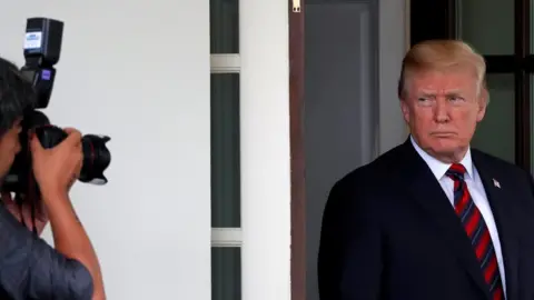 Reuters U.S. President Donald Trump looks at a photographer after a meeting with South Korea"s President Moon Jae-In at the White House in Washington, U.S., May 22, 2018.