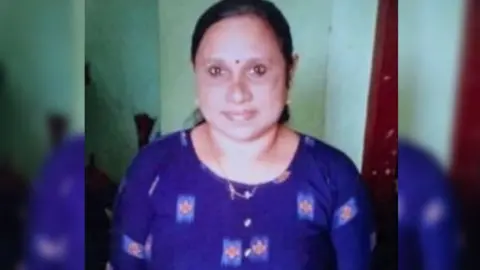 Arun Chandra Bose Rosily seen in a blue kurta