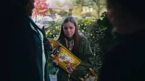 PA Media Girl with skateboard