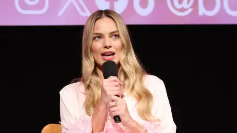 Getty Images Margot Robbie speaks at the special screening and Q&A of Warner Bros. Pictures’ BARBIE at Linwood Dunn Theater at the Pickford Center for Motion Study on November 18, 2023