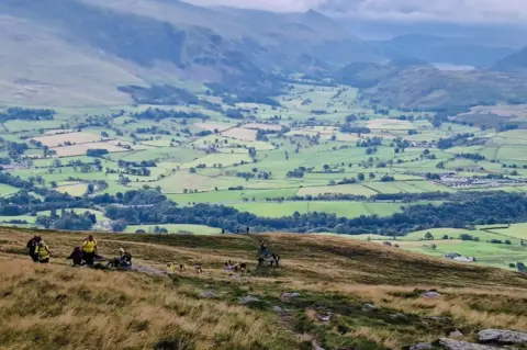 Hospice at Home Walkers make their way up Blencathra