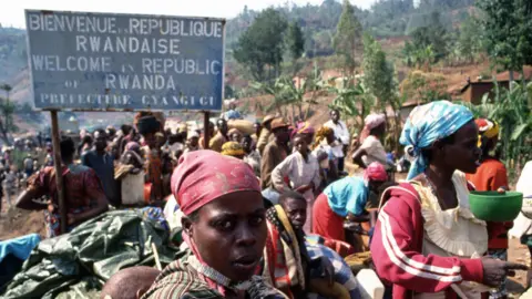 Getty Images Refugees at a border crossing between Rwanda and Zaire (now the Democratic Republic of Congo) in 1994