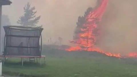 Daviot wildfire burns in the back garden of house