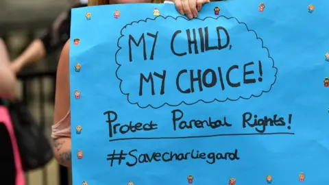 Getty Images poster reads my child my choice! protect parental rights