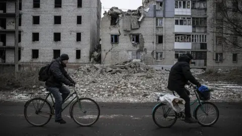 Getty Images Buildings hit by Russian missiles in Ukraine