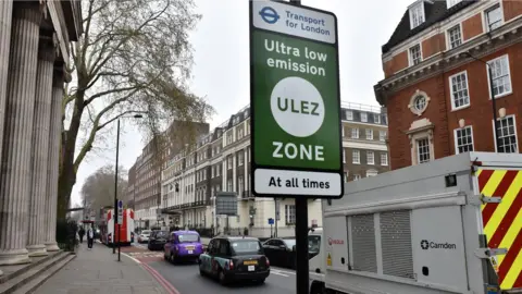 Barcroft Media Ultra-low emission zone with traffic behind