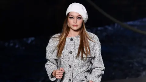 Getty Images Gigi Hadid walks the runway during Chanel Cruise 2018/2019