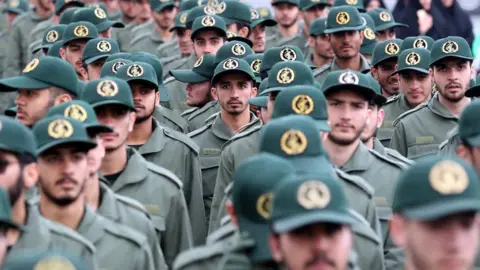 EPA Iranian Revolutionary Guards personnel in Tehran on 11 February 2019