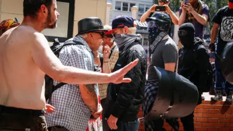 Getty Images Activists from both the far right and left faced off in Portland on Saturday