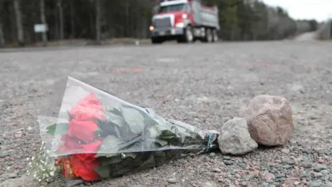 Getty Images Flowers lay at a crime scene at the side of the Plains Road April 20, 2020 in Debert, Nova Scotia, Canada