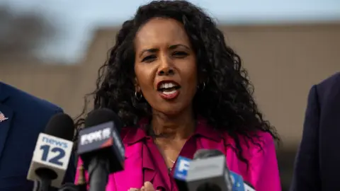 Bloomberg via Getty Images Republican congressional candidate Mazi Pilip speaks at a press conference.