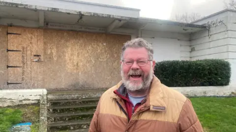 LUKE DEAL/ BBC John Cook, in front of the boarded up Broomhill Lido