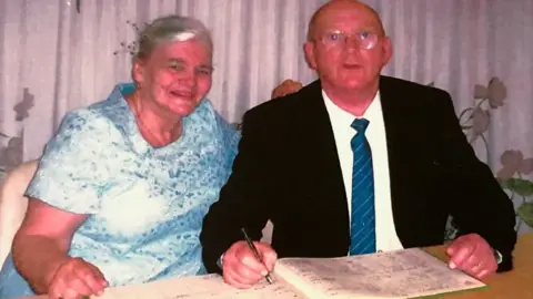 Dorset Police Cathy and Nigel on their wedding day in 2003