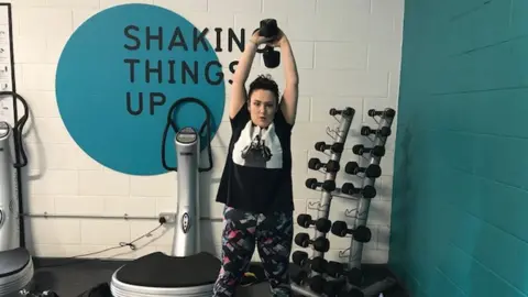 Steph working out in the gym