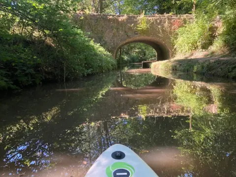 Paddleboarding on the Monmouth to Brecon canal near Abergavenny