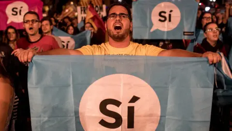 Getty Images Crowds listen to Carles Puigdemont on 1 Oct