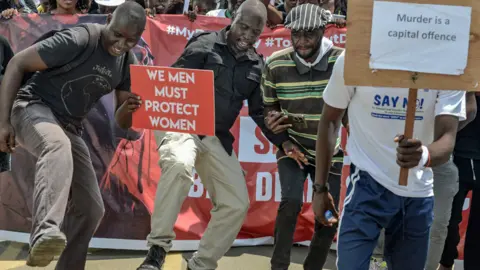 Getty Images Male rotesters against femicide in Nairobi, Kenya - Saturday 27 January 2024