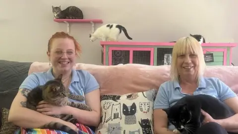 Lauren and Karen with cats