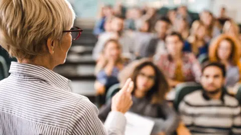 Getty Images Female lecturer