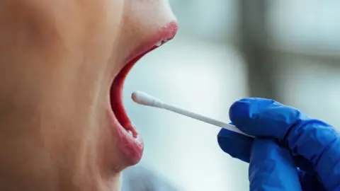 Getty Images woman having a swab test