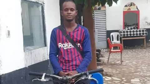 Mamadou Safayou Barry Mamadou Safayou Barry with his bike