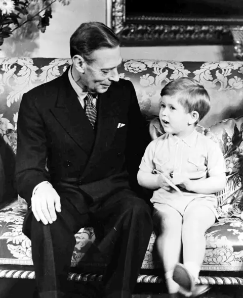 PA King George VI with his grandson Prince Charles