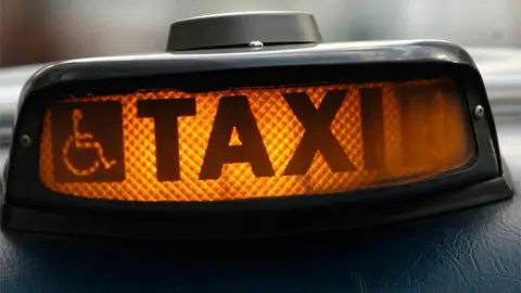 PA Media Taxi sign